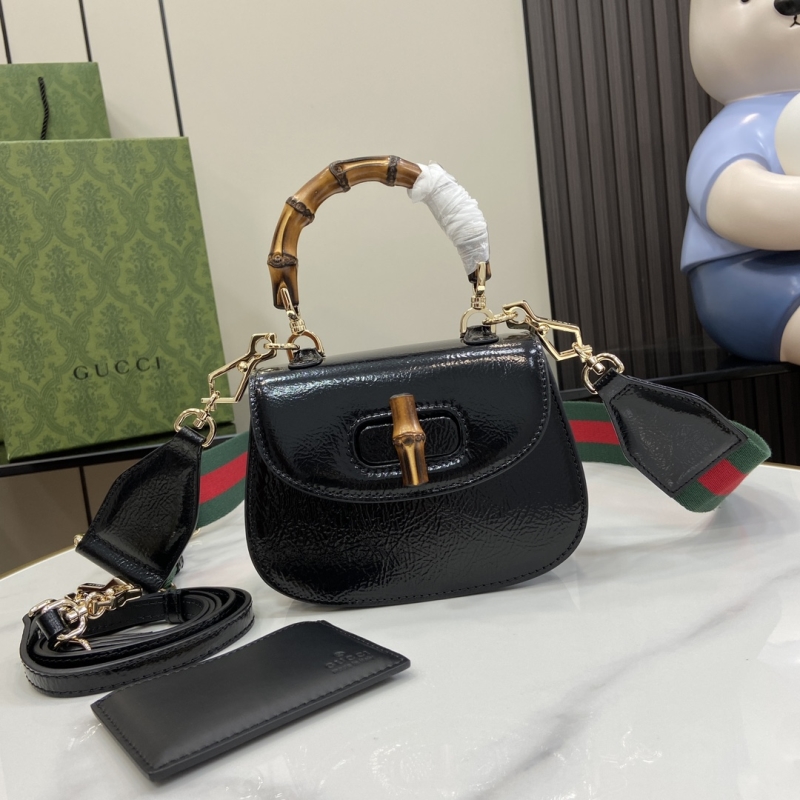G*u*i top handle bags